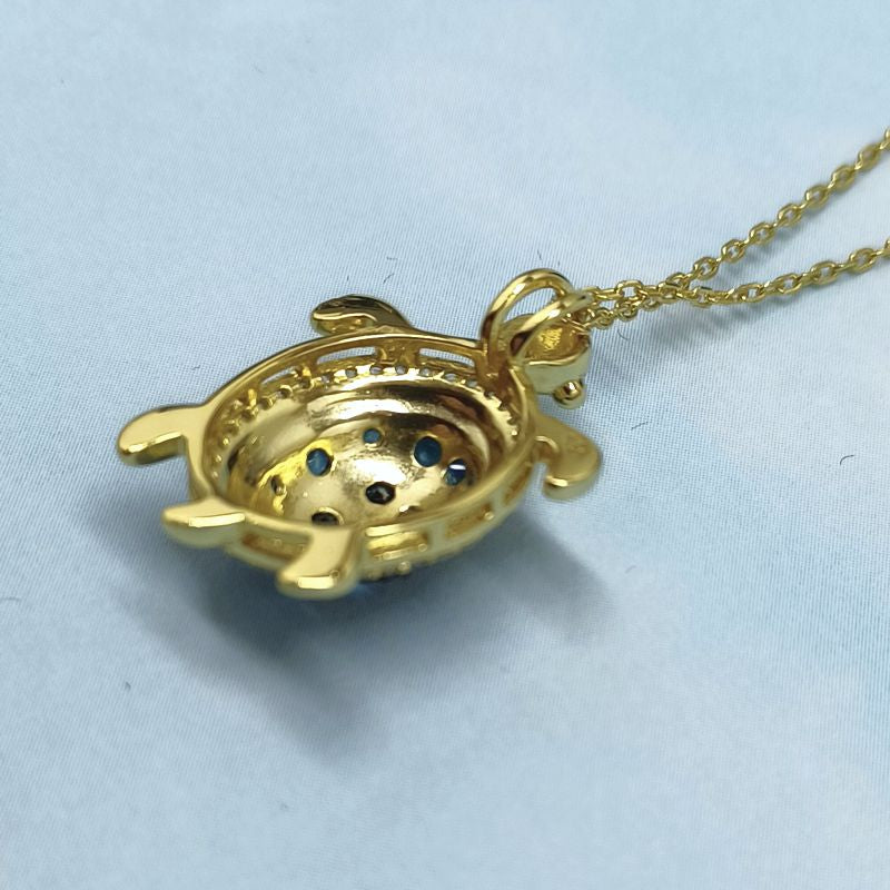 Sterling Silver Gold plated Turtle Pendant with Blue Gems